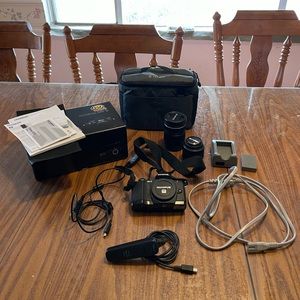 Olympus OM D EM10 Mirrorless Camera, Lens, and accessories